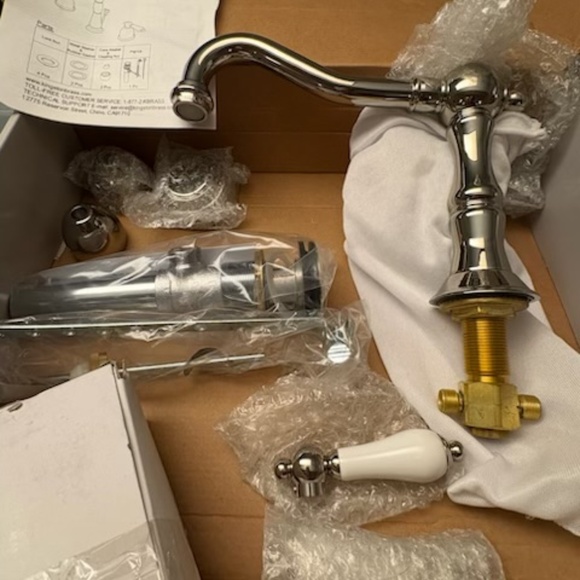 Kingston Brass polished nickel bathroom faucet wide spread - Picture 5 of 11